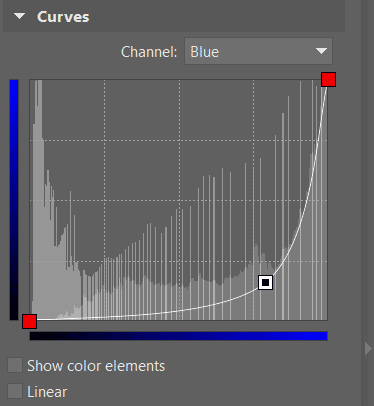 This curve shape in the blue channel has moved the blue tones in the picture towards yellow. To see the changes, move the slider between the two images.