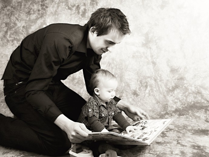 A nice studio snapshot. Originally the goal might have been to produce a baby picture, but in a few years, both father and son will appreciate this image of their time together. Author: Photos by MiLiS