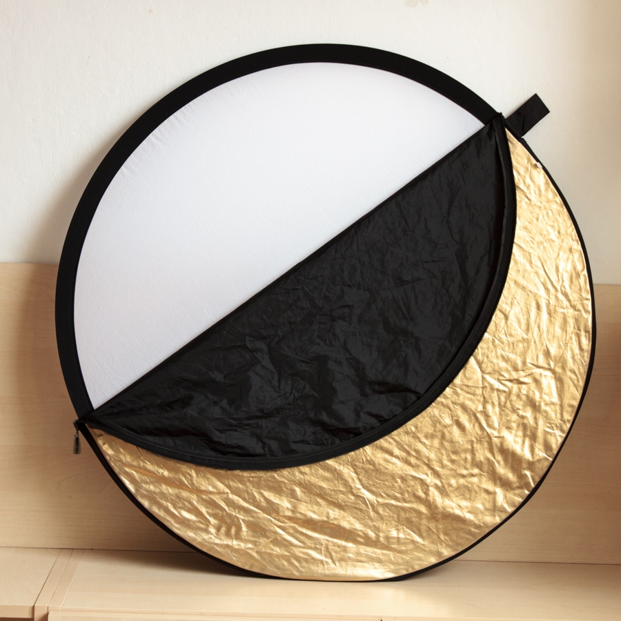 A reflector, which you can buy in kits like this 5-in-1 kit, is the main way to modify the characteristics of natural light.
