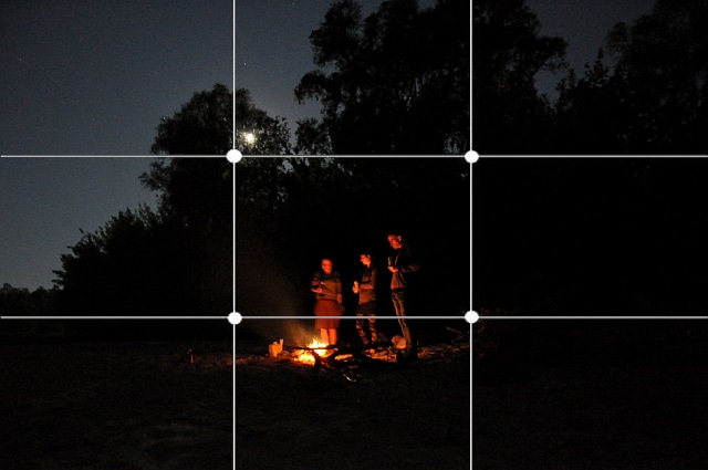 The photo’s theme is placed in roughly the center of the photo. The moon—placed very cleverly—is about a third of the way in, so that it supports the night’s atmosphere.