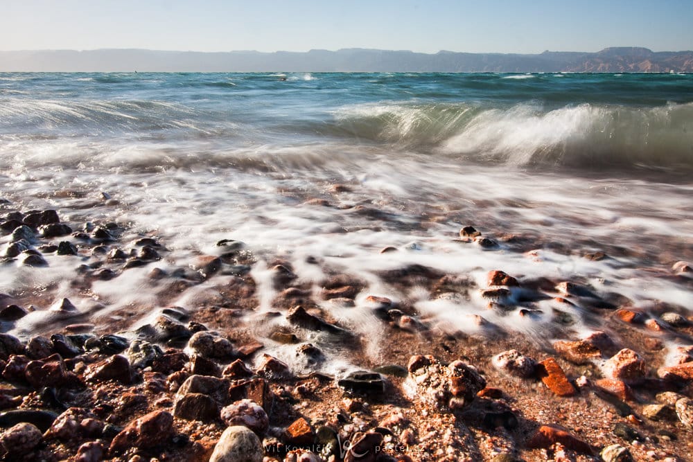 This very close shot of the Red Sea shows that its shore is... red. Canon 40D, Canon EF-S 10–22/3.5–4.5, 1/320 s, f/8.0, ISO 400, focal length 10 mm