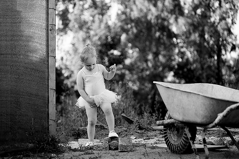 I happened to be in the garden when my daughter ran out to show off the “outfit” that she and her sister had created. I had my camera with me, and so I took a few shots, but they weren’t turning out. But after that I got to talking with my neighbor, and my daughter started exploring the garden. I then caught her in this “ballet” pose. Canon EOS 6D, Canon EF 100/2.8, 1/400 s, f/3.2, ISO 200, focal length 100 mm