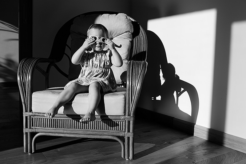 Kids love to copy us, and here I made use of that. First I sat down in this chair (which wasn’t specially prepared for the shot), and when my daughter shouted “Me too!” I let her take over. She pulled out some paper 3D glasses and put them on. Without them the photo would be less interesting and would look staged. Canon EOS 6D, Canon EF 35/1.4 L, 1/1000 s, f/4, ISO 100, focal length 35 mm