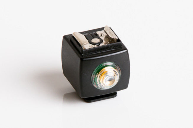 A cube for optically firing a remote flash. Photo: Vít Kovalčík