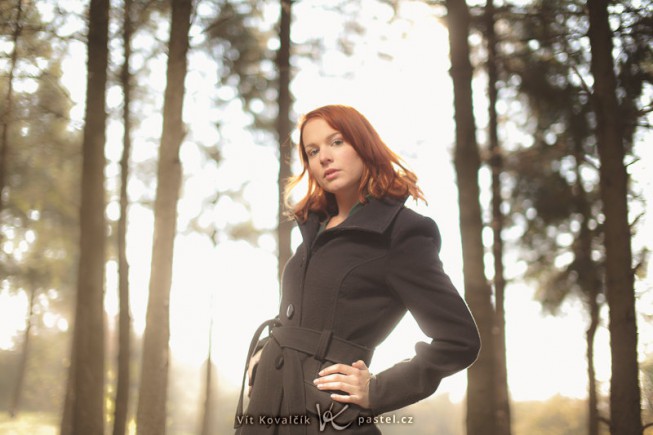 It’s still dark at the edge of the forest, but the light beyond the trees is bright.  So I turned the tables in my favor by using a flash and a photographer’s umbrella (to diffuse the light) placed above the model. Canon EOS 5D Mark II, Sigma 50 mm F1.4 EX DG HSM, 1/400 s, F1.4, ISO 50.