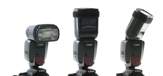 An external flash, shoe-mounted atop a camera, can be rotated to various angles to illuminate a scene by reflecting light off the ceiling or a wall.