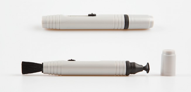 A lens pen and its two cleaning ends.