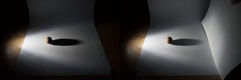 Reflector paper. Its effects are only perceptible on the closest parts of the scene. Here, too, moving the light source farther away will help to reduce the attenuation.