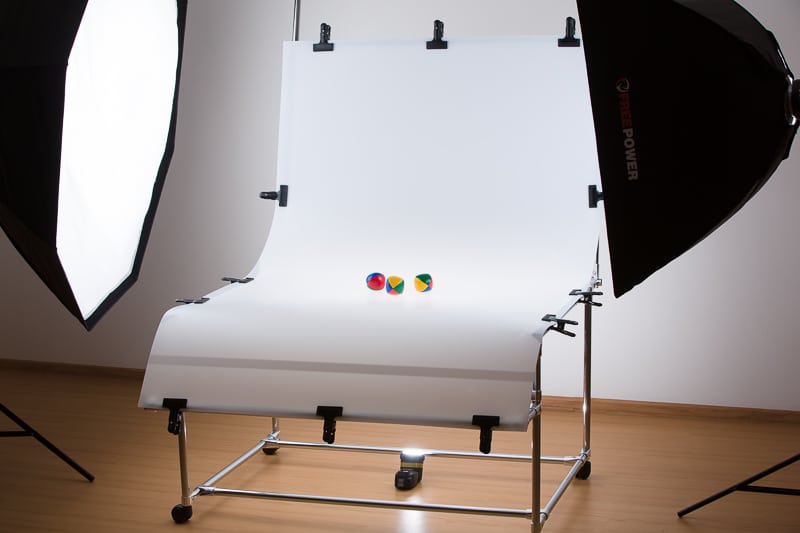 A scene with a shooting table with three lights.