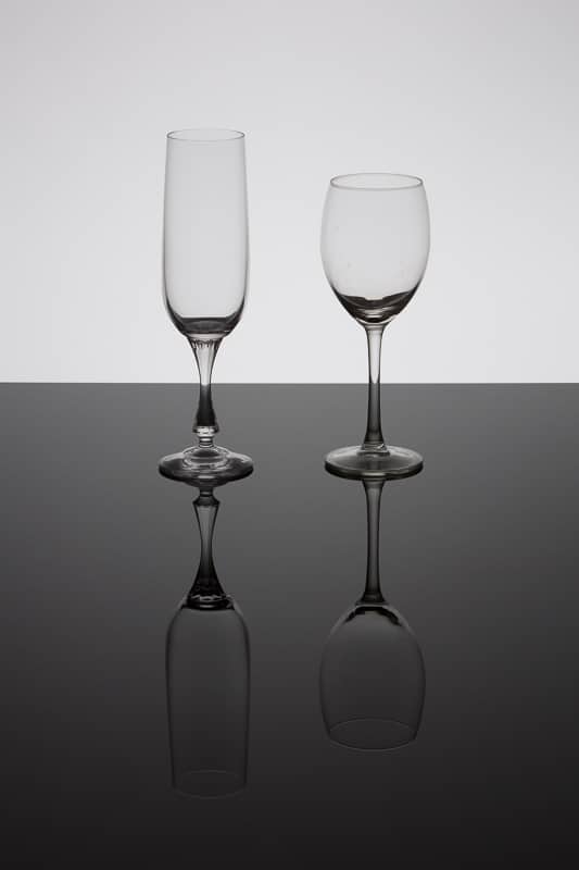 Glasses against black glass.