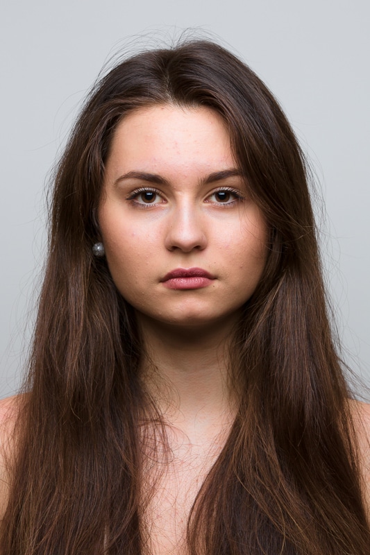 A portrait photographed with a 150 mm focal length.