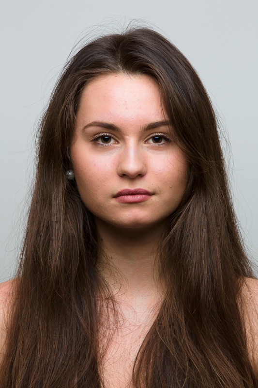 A portrait photographed with a 235 mm focal length.