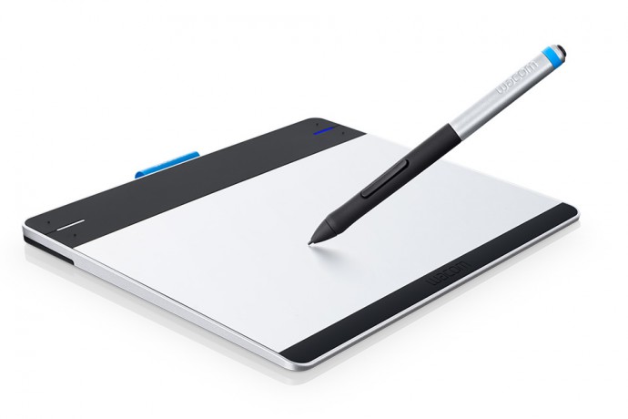 A drawing tablet and its pen. A simple and effective tool for work with photographs.