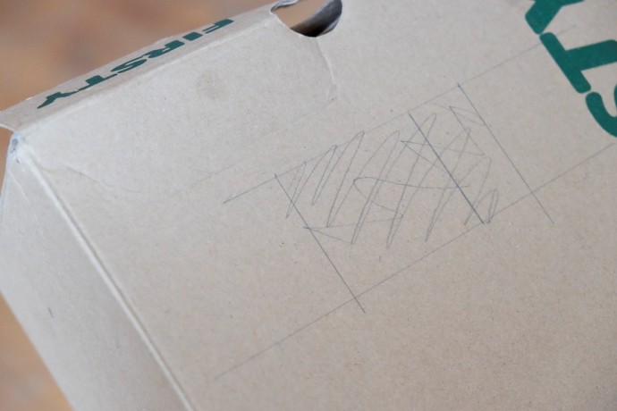 Sketch out the hole for the flash onto the back part of the box.