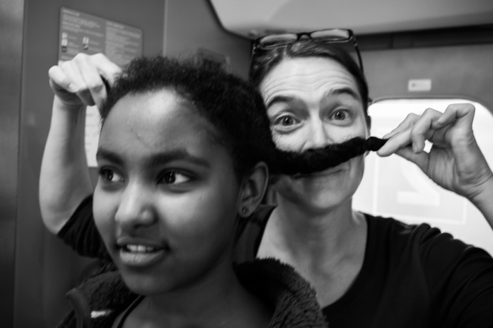 Katrin and her adopted daughter Zoe. This photograph was taken at a workshop whose goal was to capture life stories in the spirit of the “Humans of…” series on a train. 