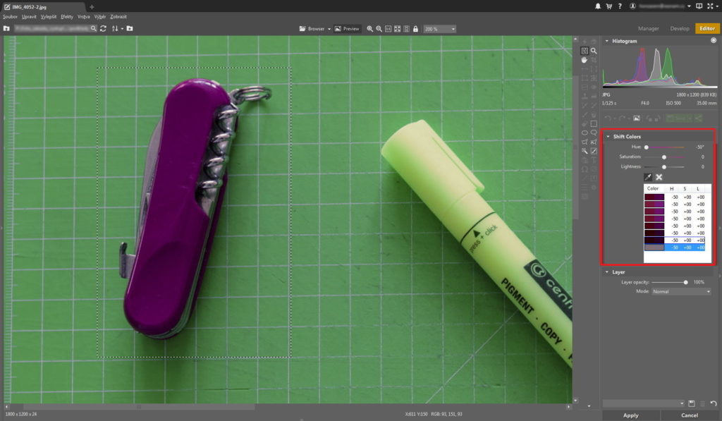 The first step in changing the color of a red object with Shift Colors. First I made a simple rectangular selection around the knife, and then I used Shift Colors on that selection. With the maximum shift available in one use of Shift Colors, I managed to change the knife’s color from red to purple.