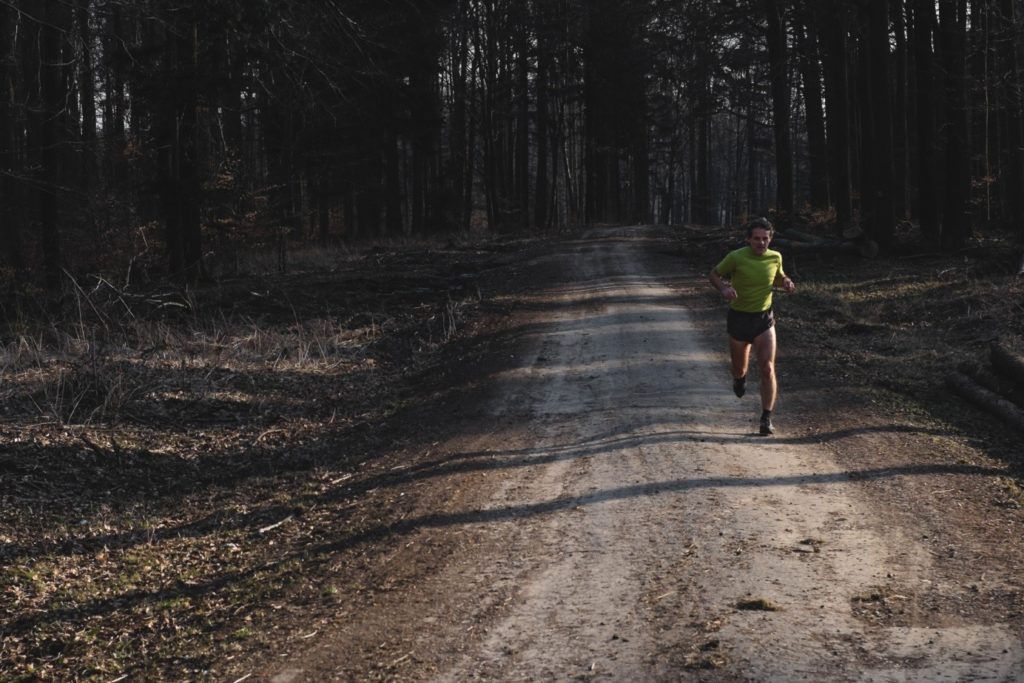 In winter the Sun is considerably lower than it is in summer, and so it throws longer shadows. During this shot, the sun’s rays were leaning almost horizontally into the runner, and so they’ve formed a sharp outline of him. Fujifilm X-E2, Fujifilm XF 35mm f/1.4, 1/1000 s, f/4.5, ISO 200, focal length 35 mm