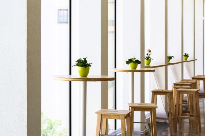 Tables in a market hall.