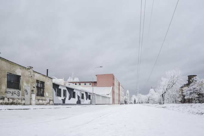 Discover the Wonders of Winter City Photography: an empty industrial riverbank.