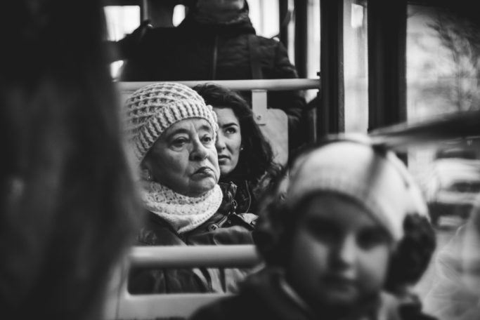 Discover the Wonders of Winter City Photography: people in public transport.