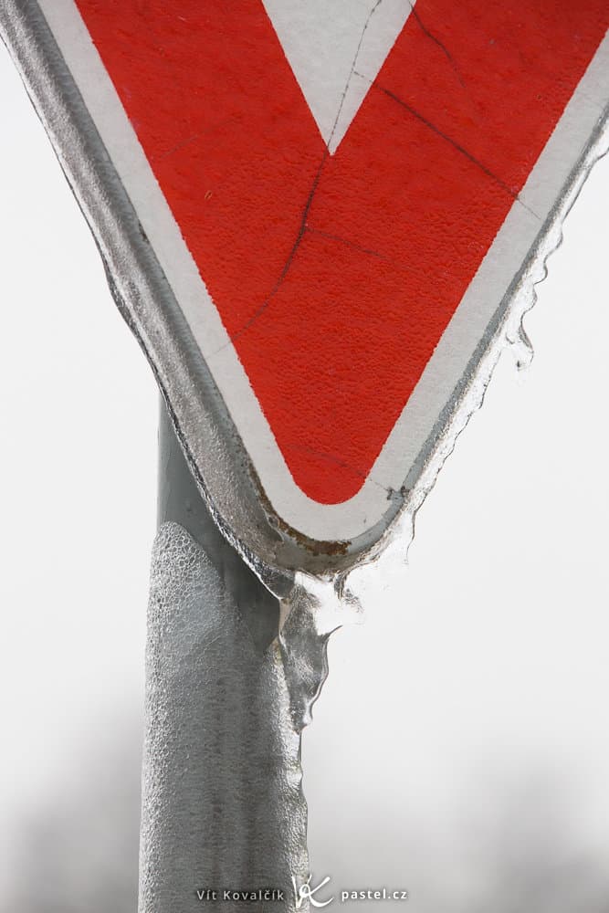 The Magical World of Glaze Ice: a road sign with translucent glaze ice.