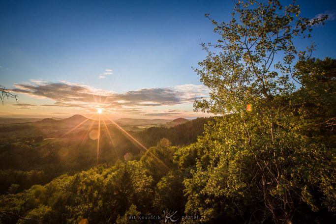 How to Photograph with the Sun in the Frame: light spots created by dust on the lens.