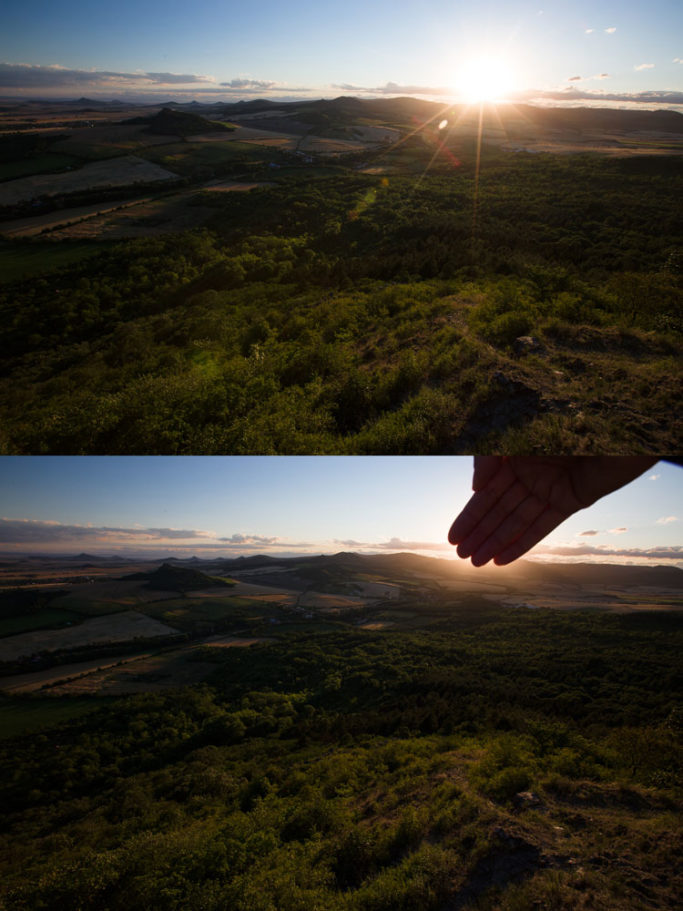 How to Photograph with the Sun in the Frame: covering the sun with hand.