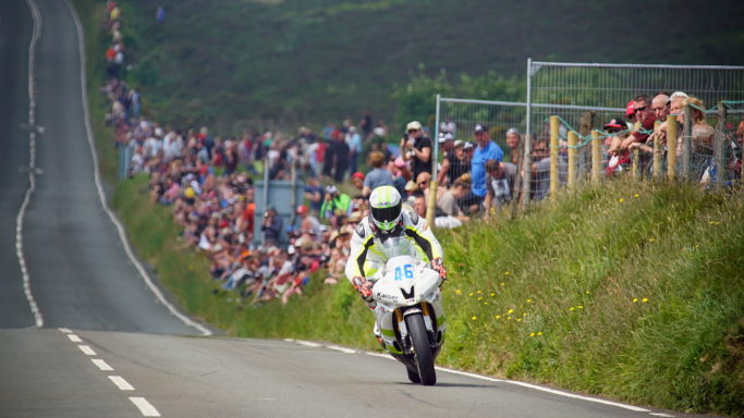 How to Photograph Motorcycle Races: with this picture, I had to crop heavily despite using an APS-C and a 300mm focal length.