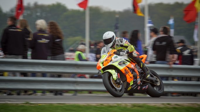 How to Photograph Motorcycle Races: A picture taken from the fan zone.