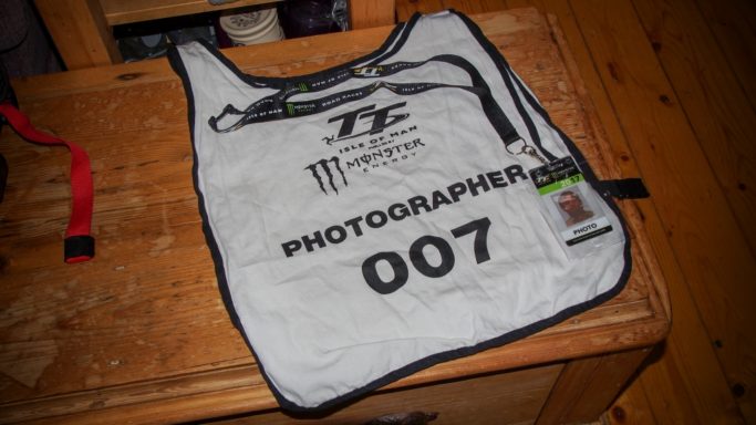 How to Photograph Motorcycle races: a vest numbered 007.