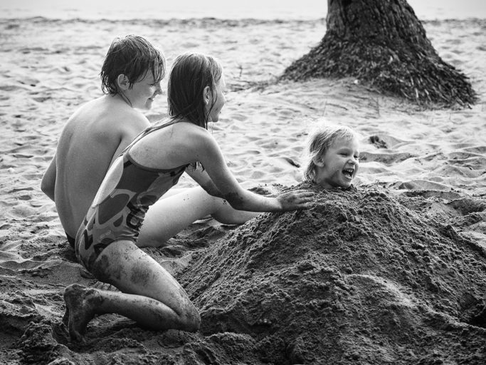 Vacation with a Camera and with Family: Children playing in the sand.