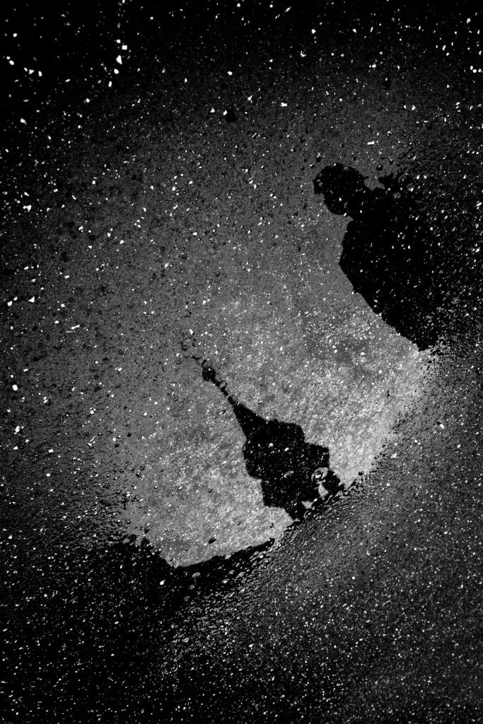 Improve your black and white pictures: the texture of a concrete sidewalk.
