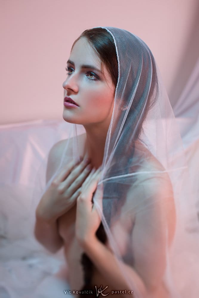 Nude photography: a model with slightly open mouth.