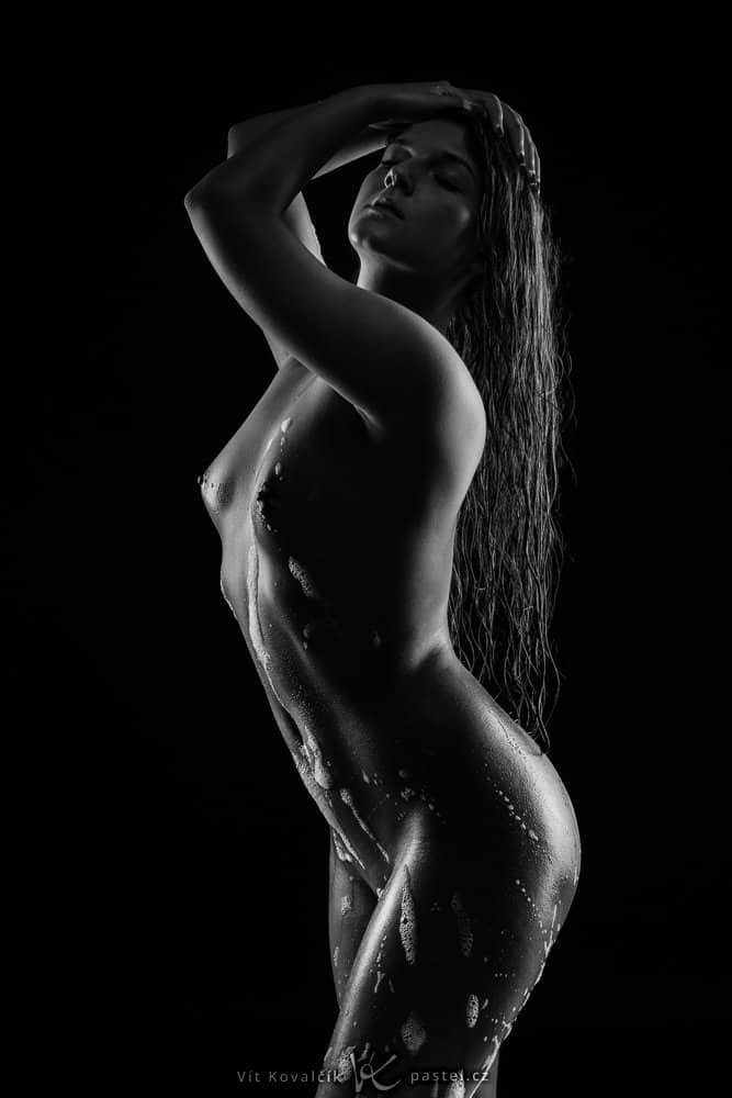 nude photography: rim light in a studio.