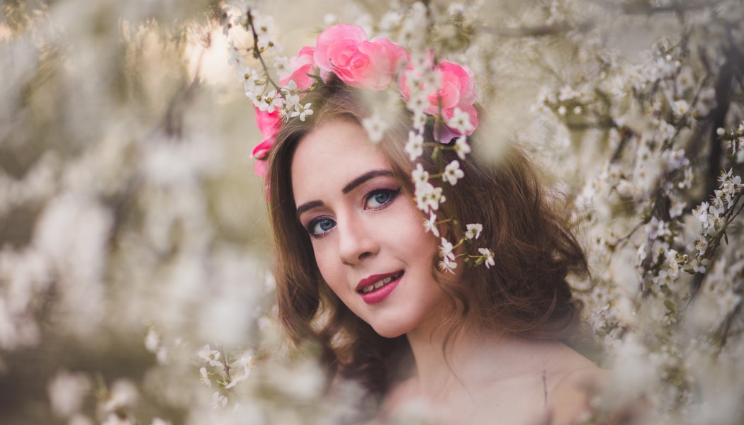 Foundations of Portrait Composition Part - portrait of a girl with tree sticks and flowers in her hair