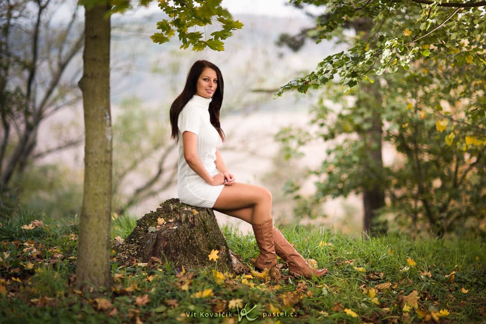 Foundations of Portrait Composition Part - photo of a woman in white dress, who is sitting down