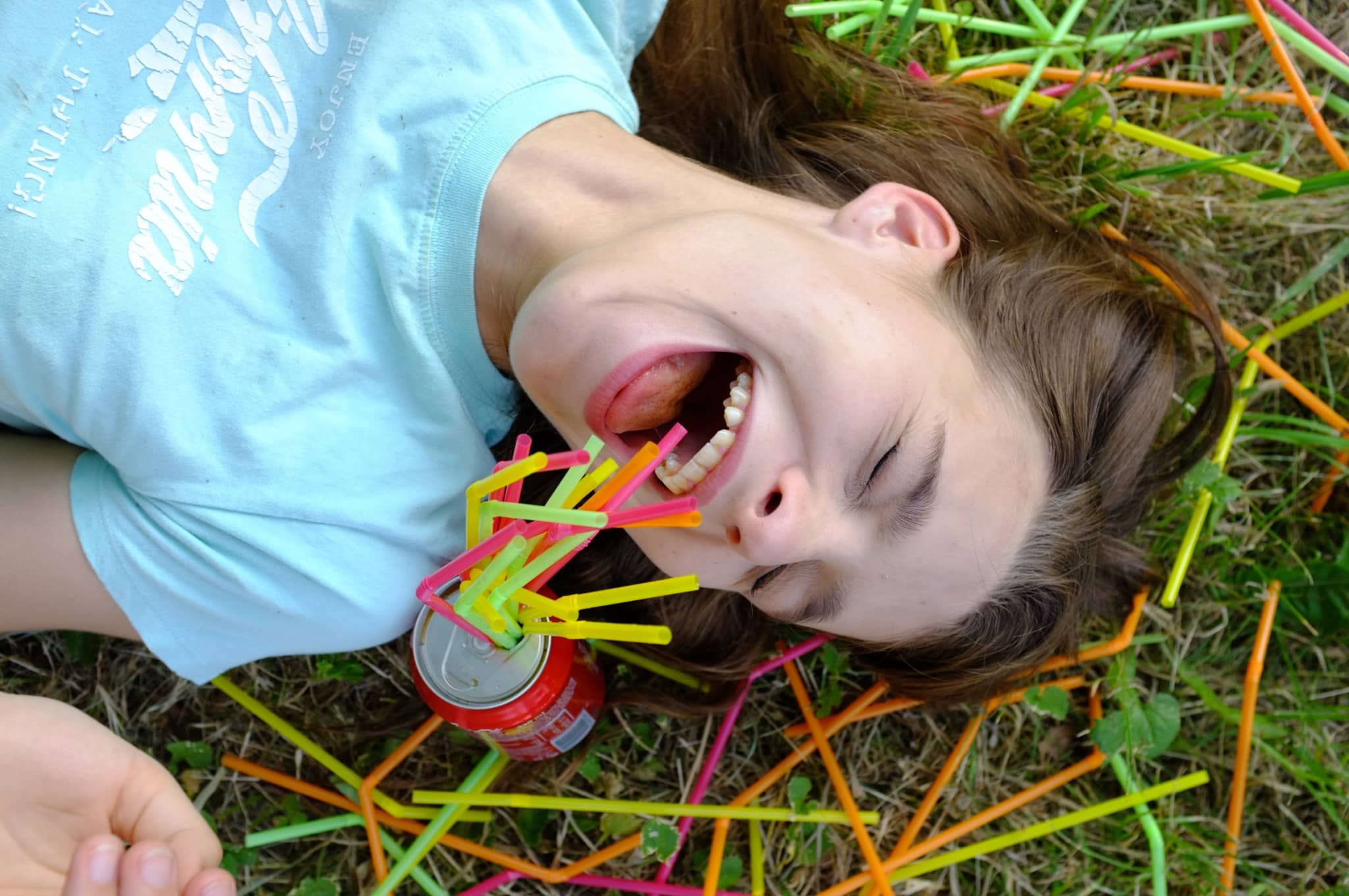 Portrait School I: The Secrets to Success? - model playing with straws