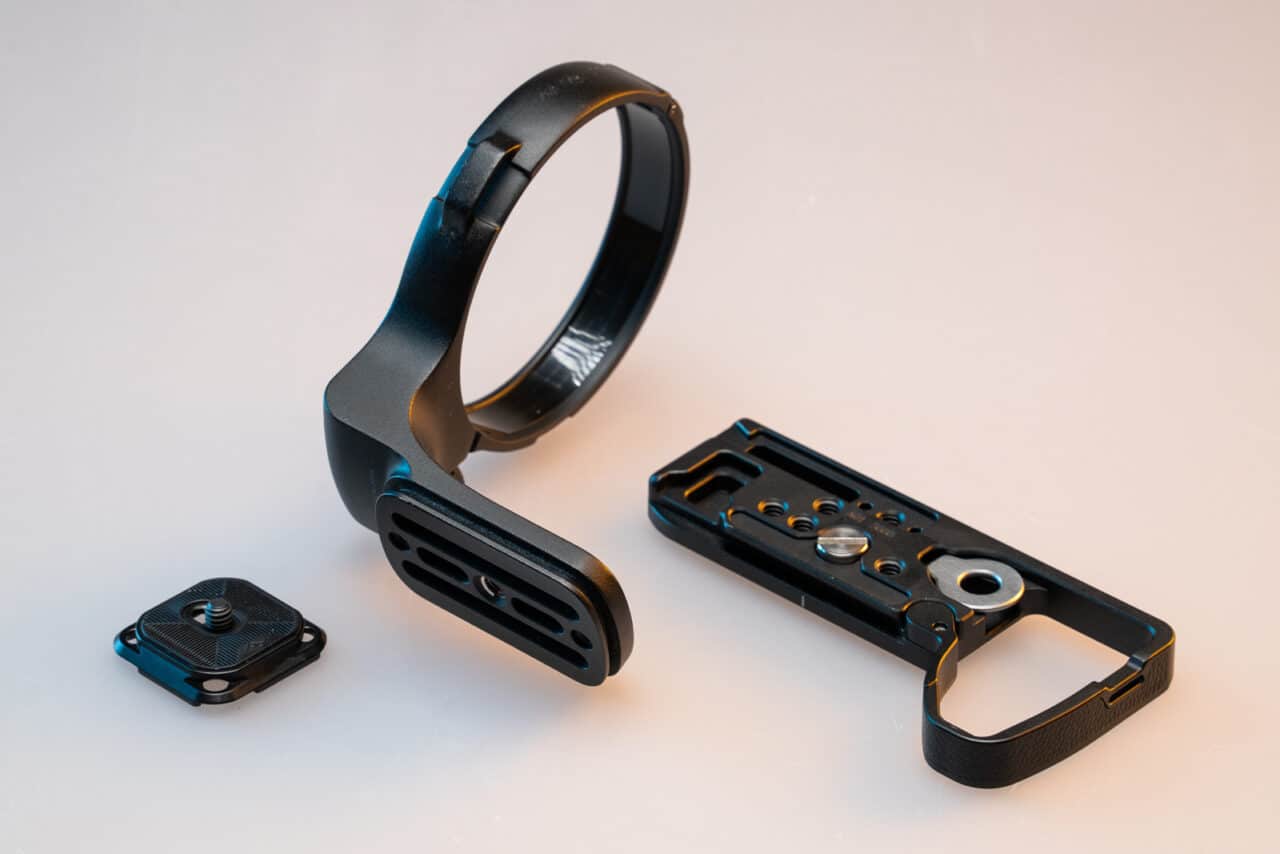 Arca-Swiss compatible accessories: Peak Design plate, Tamron tripod collar, and SmallRig camera extension.
