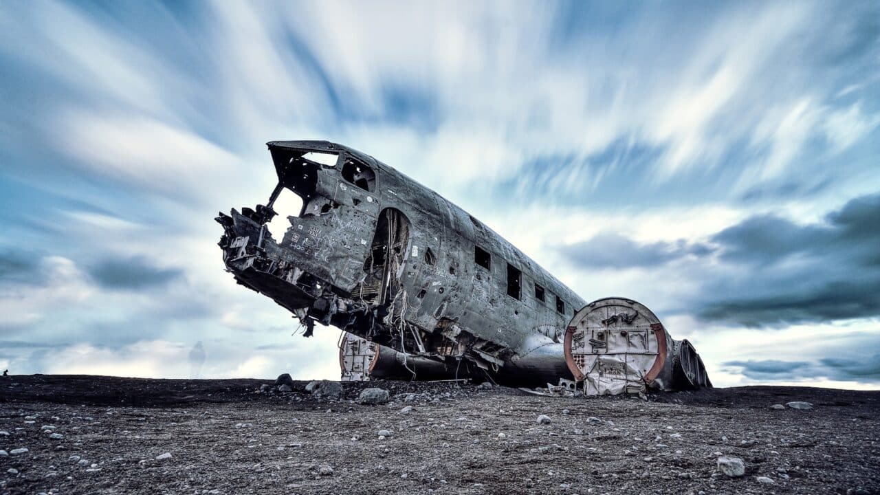 Accident of Douglas DC-3 at Sólheimasandur, Iceland. The long shutter speed captured the moving clouds and removed the visitors moving around the wreck (shutter speed increased to 2 min using the ND filter).