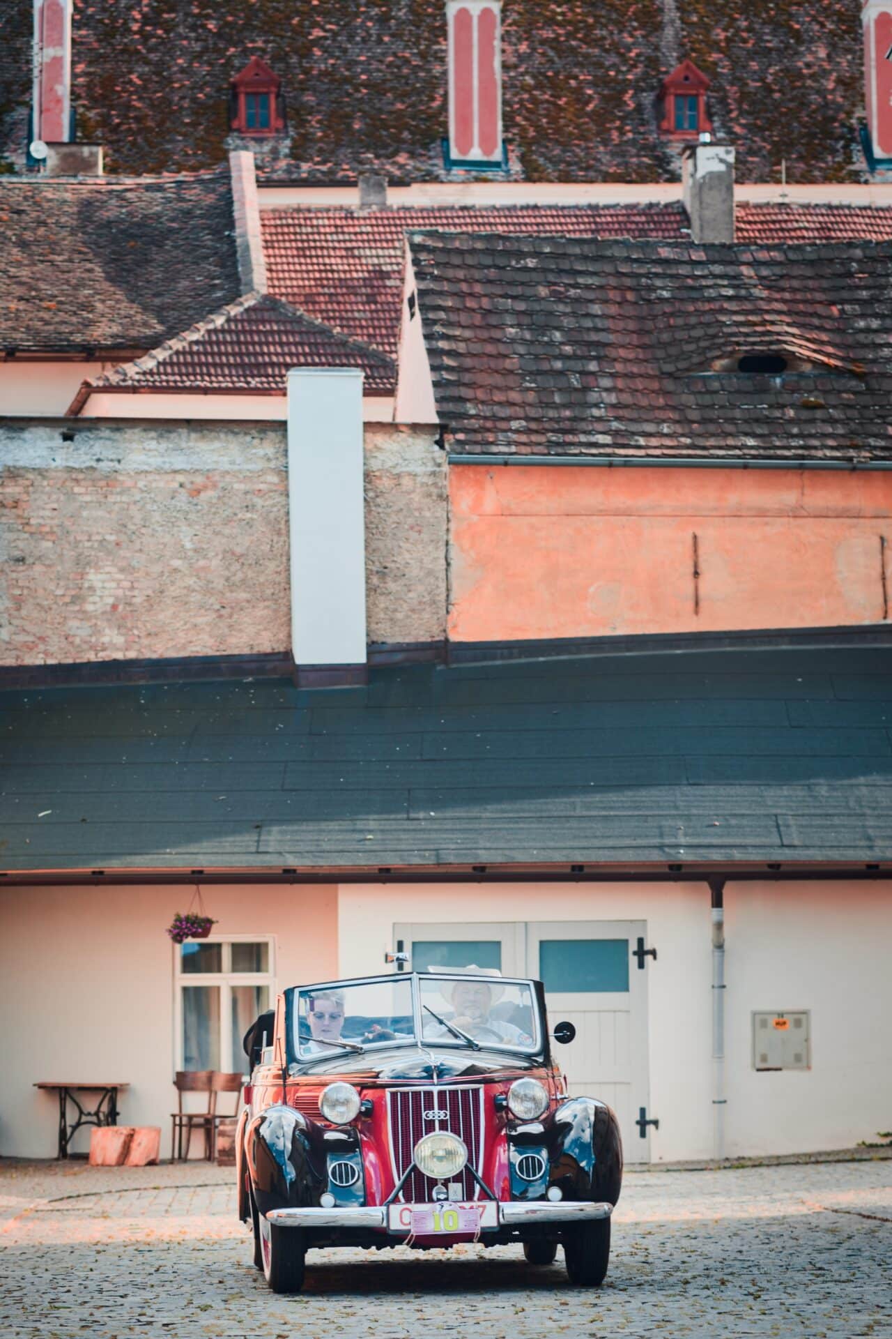 car, The roofs of Opočno, Czechia. The background plays an important role in car photography. 