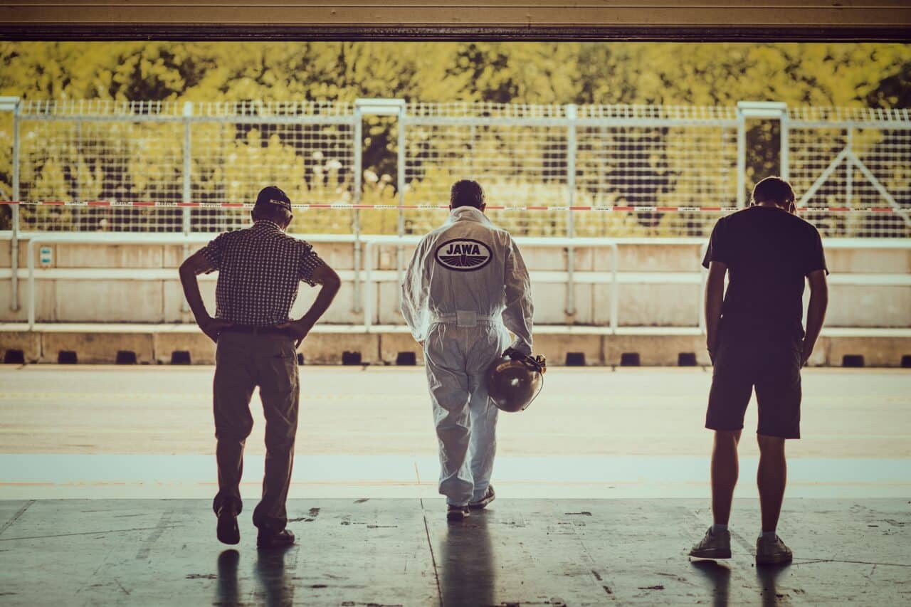 car photo, galerie, A moment from the Brno pit stop. I was intrigued by how everyone is caught up in their own thoughts.